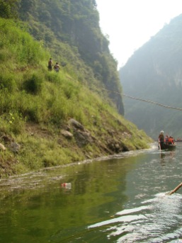 towing the boat upstream by rope